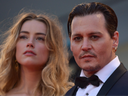 FILE: Johnny Depp and Amber Heard arrive for screening of the movie
