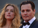 FILE: Johnny Depp and Amber Heard arrive for screening of the movie 