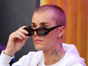 Singer Justin Bieber attends Super Bowl LVI between the Los Angeles Rams and the Cincinnati Bengals at SoFi Stadium on February 13, 2022 in Inglewood, California.