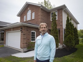 Immobilienmakler Luca Andolfatto posiert für ein Porträt in Kingston, Ontario, Samstag, 21. Mai 2022.