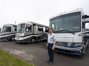 Bucars RV Centre general manager Jeff Redmond with new recreational vehicles on his lot in Balzac, Alta. on Tuesday, May 17, 2022. With gasoline prices hitting all-time highs, Redmond says he's planning to stay closer to home when RV camping this summer. But he adds recreational vehicles are still one of the most affordable ways to travel as a couple or with a family once other costs are factored in.