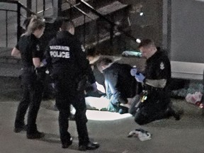 Picture from a video shot May 21, 2022 shortly after 10 p.m. near Rogers Arena in Vancouver, B.C. A suicidal man dropped to his knees after a Vancouver police officer discharged a Taser.