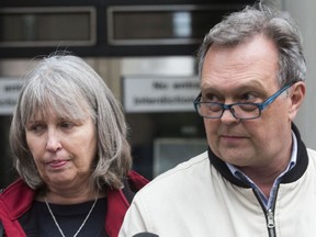 Clayton and Linda Babcock (parents of Laura Babcock) outside 361 University Ave courthouse.