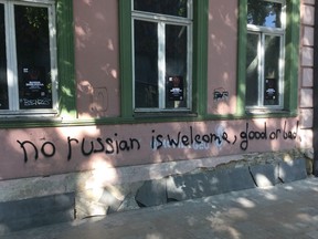 An anti-Russian message is spray-painted on a wall in Tbilisi, the capital of Georgia, as Russia's invasion of Ukraine continues.