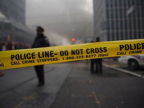 Police tape is seen in Toronto on Tuesday, February 14, 2017.&ampnbsp;Hamilton police say they have arrested a 19-year-old man after a threat was made at Westdale Secondary School. It's the latest arrest in a series of investigations revolving around threats made to Hamilton-area schools.The Canadian Press/Christopher Katsarov