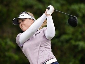 Brooke M. Henderson, of Canada, hits on the 18th tee during the final round of the ShopRite LPGA Classic golf tournament, Sunday, June 12, 2022, in Galloway, N.J.