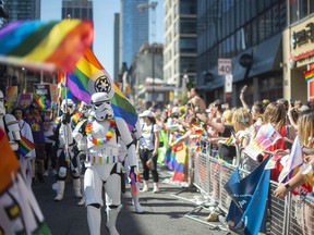 Participants take part in the 2019 Pride Parade in Toronto, Sunday, June 23, 2019.