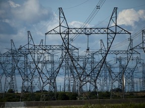 Power lines are shown in Mississauga, Ont., on Monday, Aug. 19, 2019.