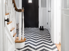 Herringbone tile lends visual impact and durability to the entryway of a century home in North Toronto.