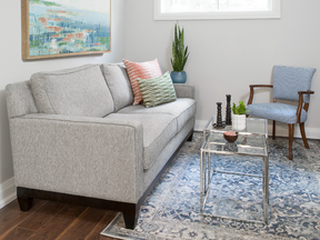 Throughout the suite, wide-plank vinyl flooring in natural walnut is heated for comfort. Rugs also keep the space cozy.