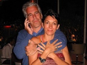 (FILES) In this file undated trial evidence image obtained December 8, 2021, from the US District Court for the Southern District of New York shows British socialite Ghislaine Maxwell and US financier Jeffrey Epstein.
