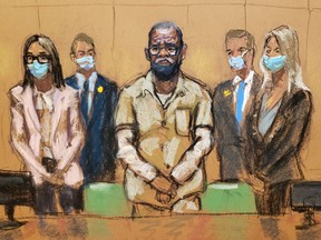 R. Kelly stands with his lawyers Jennifer Bonjean and Ashley Cohen during his sentencing hearing for federal sex trafficking at the Brooklyn Federal Courthouse in Brooklyn, New York, U.S., June 29, 2022 in this courtroom sketch.