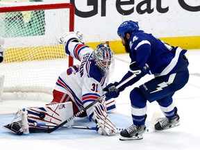 Jun 11, 2022; Tampa, Florida, USA; Tampa Bay Lightning defenseman Zach Bogosian (24) shots against New York Rangers goaltender Igor Shesterkin (31) during the second period of game six of the Eastern Conference Final of the 2022 Stanley Cup Playoffs at Amalie Arena.