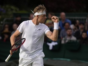 Canada's Denis Shapovalov celebrates winning a point against France's Arthur Rinderknech during their singles tennis match on day two of the Wimbledon tennis championships in London, Tuesday, June 28, 2022.