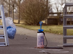 The Canadian Food Inspection Agency is reporting more outbreaks of avian flu in domestic flocks in British Columbia and Alberta. A disinfectant spray sits at the front gate of a farms in Abbotsford, B.C. after turkeys at on the farm tested positive for the avian flu virus, Sunday, January 25, 2009.