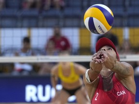 Canada's Brandie Wilkerson goes for the ball during the beach volley semifinal match between Germany's Mueller-Tillmann and Canada's Bukovec-Brandie at the beach volley World Championships in Rome, Saturday, June 18, 2022. &ampnbsp;THE CANADIAN PRESS/AP/Andrew Medichini