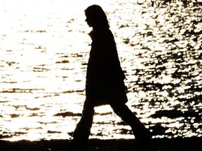 The Standing Committee on the Status of Women's report on addressing intimate partner and family violence, released on Friday, makes 28 recommendations to the government. The report says women tend to face disproportionate levels of economic insecurity compared to men, and financial barriers are one of the primary factors preventing women from escaping situations of intimate partner and family violence. A young woman is silhouetted in Ottawa's west end Thursday, October 20, 2005.