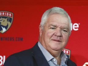 The Vancouver Canucks have hired former Chicago Blackhawks and Florida Panthers general manager Dale Tallon as a professional scout and senior adviser. Tallon is seen at a news conference in Sunrise, Fla. on July 2, 2019.