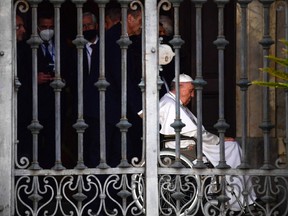 Pope Francis, seated in a wheelchair following knee treatment, leaves after presiding over the Rosary for peace in Ukraine and end to wars worldwide, on May 31, 2022 at the Basilica of St. Mary Major in Rome.