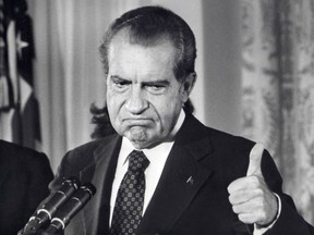 In this file photo taken on August 9, 1974 The 37th President of the United States, Richard Nixon, he bids farewell to the White House staff.  The break-in 50 years ago by Republican operatives at a Washington office led to Nixon's historical resignation.