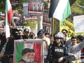People attend an Al-Quds Day rally in Toronto in 2019.