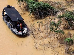 A rescue team looks for British journalist Dom Phillips and indigenous expert Bruno Pereira near Atalaia do Norte, Amazonas state, Brazil, June 10, 2022.