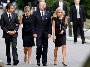 Hunter and Kathleen Biden (L) arrive on Aug. 29, 2009, with then-vice president Joe Biden and his wife Jill Biden at Arlington National Cemetery for the burial of Sen. Edward Kennedy in Arlington, Va.