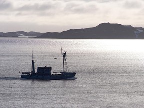 A Danish navy ship sails through the waters of Greenland's west coast in 2005.