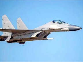 A Chinese PLA J-16 fighter jet flies in an undisclosed location. Last week, the Canadian military accused Chinese planes of not following international safety norms on several occasions.