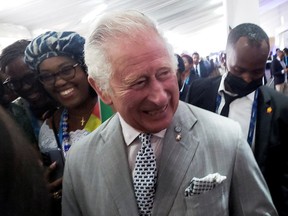Prince Charles interacts with delegates during the Commonwealth Heads of Government Meeting in Kigali, Rwanda June 23, 2022.