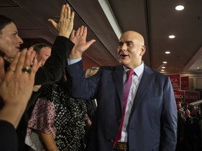 Ontario Liberal Party Leader Steven Del Duca high fives candidates after speaking in Toronto,, March 26, 2022, as the party launched its election campaign.
