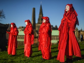 Extinction Rebellion climate activists demonstrate in Glasgow during the COP26 climate summit on Nov. 13, 2021.