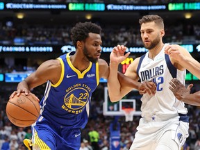 Canadian Andrew Wiggins, left, has helped the Golden State Warriors become a threat again with his elevated play.