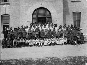 Group of students, Indian Industrial School, Brandon, Manitoba, 1946.   CANADA. NATIONAL FILM BOARD OF CANADA. PHOTOTHÈQUE. LIBRARY AND ARCHIVES CANADA, PA-048574