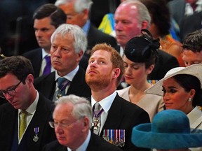 Prince Harry at the National Service of Thanksgiving held at St Paul's Cathedral as part of celebrations marking the Platinum Jubilee of Queen Elizabeth II, in London, Friday, June 3, 2022. (Victoria Jones/Pool photo via AP)
