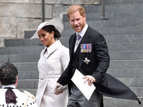 Meghan, Duchess of Sussex, and Prince Harry depart the National Service of Thanksgiving held at St. Paul's Cathedral in London on June 3, 2022, to celebrate Queen Elizabeth's Platinum Jubilee.