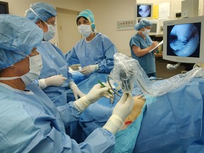 Doctors perform an operation at the Cambie Surgery Centre in Vancouver.