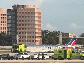 Emergency services respond to a plane at Miami International Airport after an emergency landing, in this picture obtained from social media on June 21, 2022.
