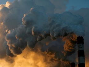 Smoke and steam billow from the Belchatow Power Station, Europe's largest coal-fired power plant, near Belchatow, Poland, in 2018.