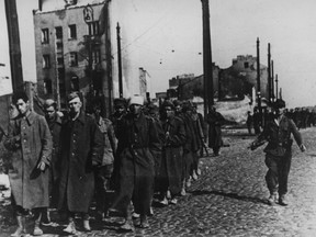 The end of Warsaw's uprising sees a group of city defenders marched off to prison camps by their German captors. Walaszczyk took part in the 1944 Warsaw Uprising, a revolt against the German occupiers that was brutally crushed.