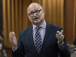Minister of Justice and Attorney General of Canada David Lametti rises during Question Period, Thursday, June 2, 2022 in Ottawa.&ampnbsp;Liberal Justice Minister David Lametti is expected to table a bill as early as Friday that would respond to a Supreme Court ruling to allow voluntary extreme intoxication as a defence for serious crimes.THE CANADIAN PRESS/Adrian Wyld