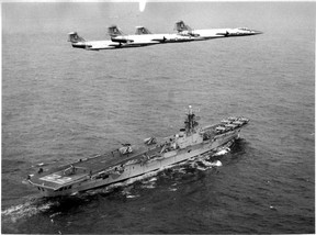 Four European-based Canadian fighters fly over HMCS Bonaventure, a Canadian aircraft carrier, in this 1968 photo.