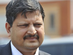 FILE - Atul Gupta, of the Gupta family, is seen outside magistrates courts in Johannesburg, Sept. 2010. Dubai police said Tuesday, June 7, 2022, that they have arrested two brothers, Atul and Rajesh from the Gupta family wanted in connection with a corruption case involving former South African President Jacob Zuma, the latest high-profile extradition case involving the United Arab Emirates. (AP Photo)