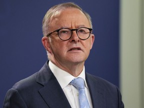 FILE - Australian Prime Minister Anthony Albanese speaks during a press conference in Sydney, Australia, Friday, June 10, 2022. Albanese said Thursday, June 23, 2022, that he will meet President Emmanuel Macron in France next week to reset a bilateral relationship that was damaged when the previous Australian government canceled a submarine contract.