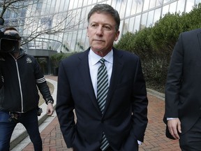 FILE - Bruce Isackson departs federal court, April 3, 2019, in Boston after facing charges in a nationwide college admissions bribery scandal. Isackson is scheduled to be sentenced on June 28, 2022.