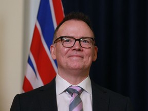 Opposition B.C. Liberal Party Leader Kevin Falcon is sworn in during an oath ceremony and introduction to the house in the Hall of Honour at legislature in Victoria, Monday, May 16, 2022.
