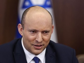 Israeli Prime Minister Naftali Bennett chairs a cabinet meeting at the prime minister's office in Jerusalem, Sunday, June 26, 2022.