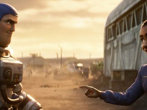 FILE - This image released by Disney/Pixar shows character Buzz Lightyear, voiced by Chris Evans, left, and Alisha Hawthorne, voiced by Uzo Aduba, in a scene from the animated film "Lightyear," releasing June 17, 2022.  Authorities across the Muslim world have barred Disney's latest animated film "Lightyear" from being played at cinemas after the inclusion of a brief kiss between a lesbian couple, the company said Thursday, June 16.