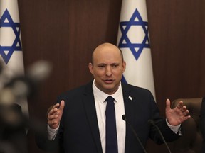 FILE - Israeli Prime Minister Naftali Bennett speaks during a weekly cabinet meeting in Jerusalem, May 1, 2022. Bennett was on a surprise visit to the United Arab Emirates on Thursday, June 9, 2022, a snap trip that came as efforts to salvage a deal over Iran's nuclear program were stalled amid a deepening standoff with Tehran. The visit was Bennett's second public trip to Abu Dhabi since Israel and the UAE agreed to normalize ties in 2020.