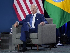 President Joe Biden listens at a meeting with Brazilian President Jair Bolsonaro during the Summit of the Americas, Thursday, June 9, 2022, in Los Angeles.